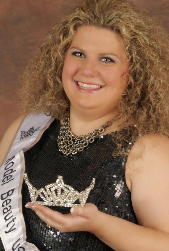 Model Beauty USA winner with crown and sash